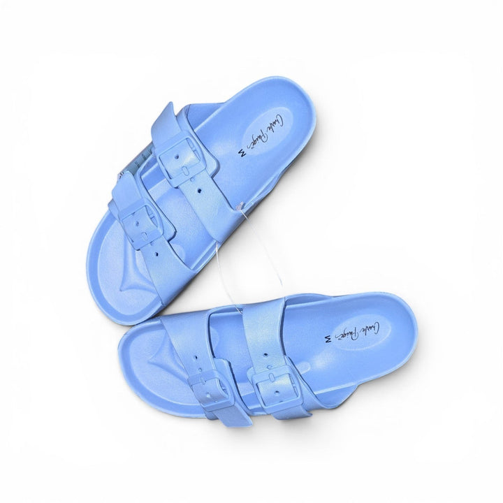 Luxury Clique periwinkle blue double buckle slide sandals with contoured footbeds on a white background