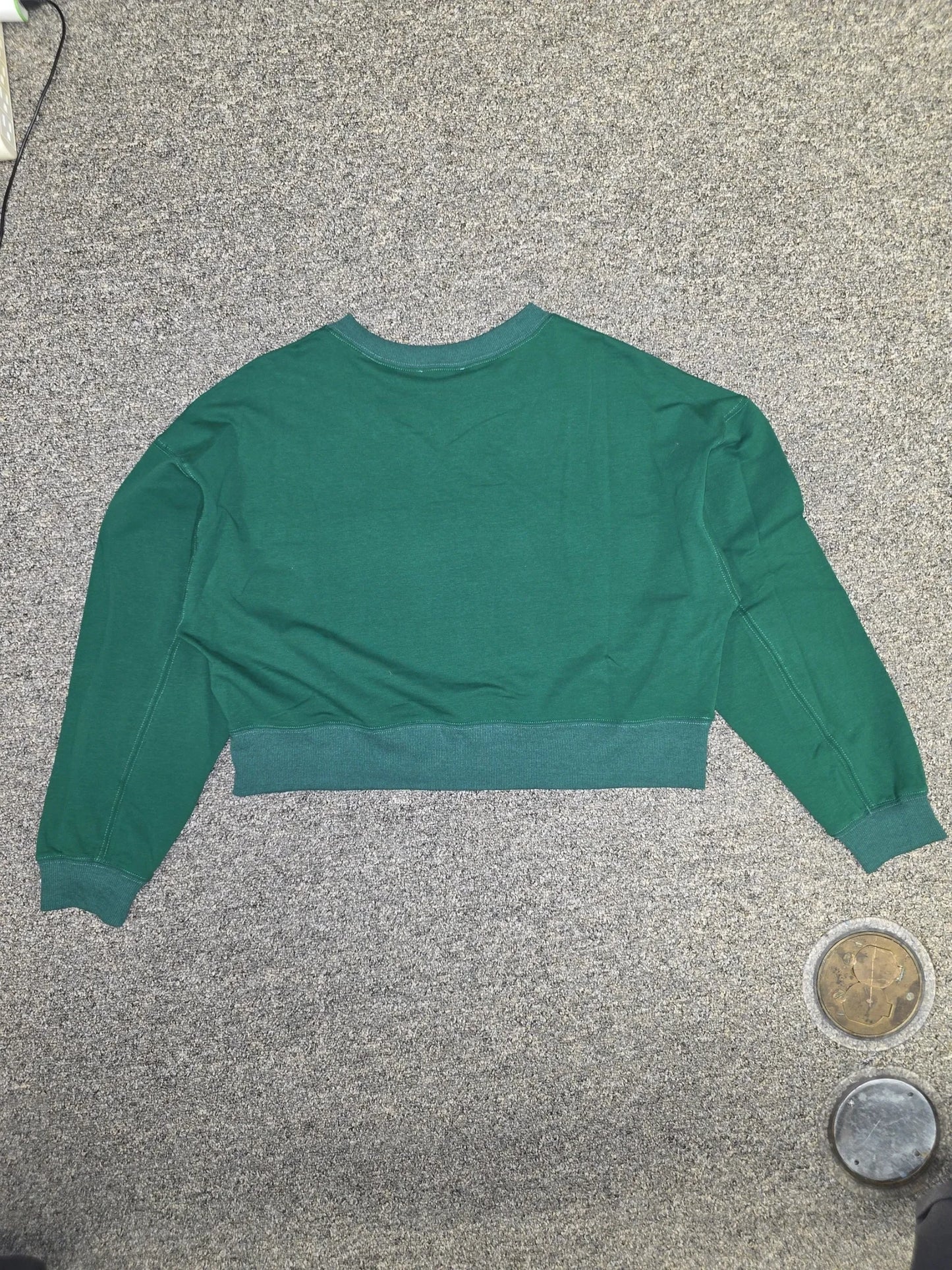 Luxury Clique forest green cropped sweatshirt with ribbed crew neck and cuffs, back view