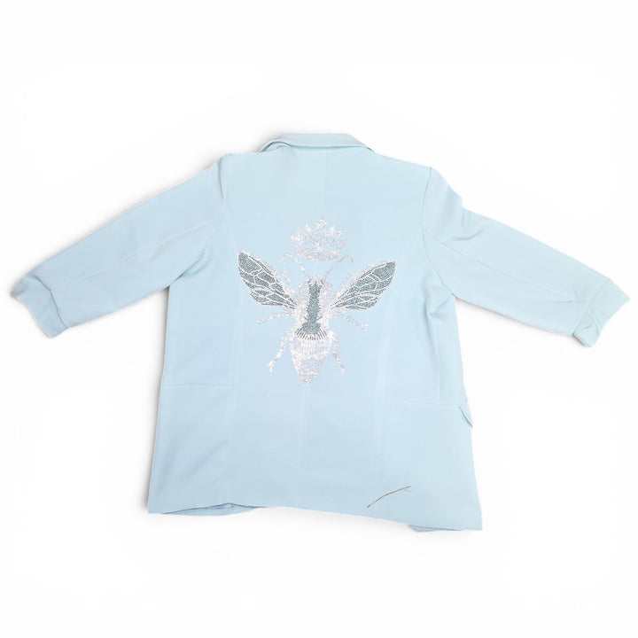 Luxury Clique light blue tailored blazer with intricate sequin and bead bee embroidery on the back