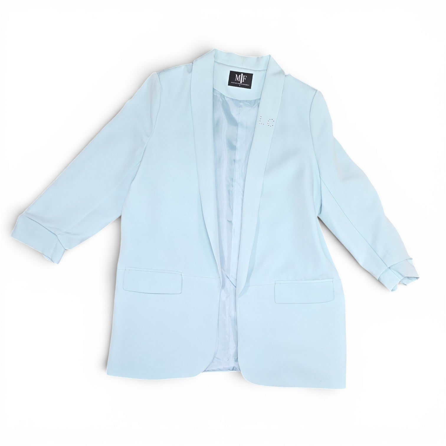 Luxury Clique light blue tailored blazer with three-quarter sleeves and a classic lapel design.